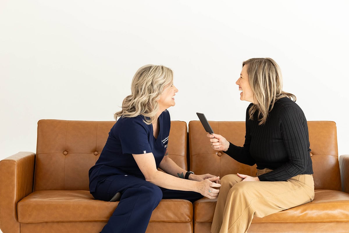 Integrative Health conversation between a practitioner and client seated together during a wellness visit
